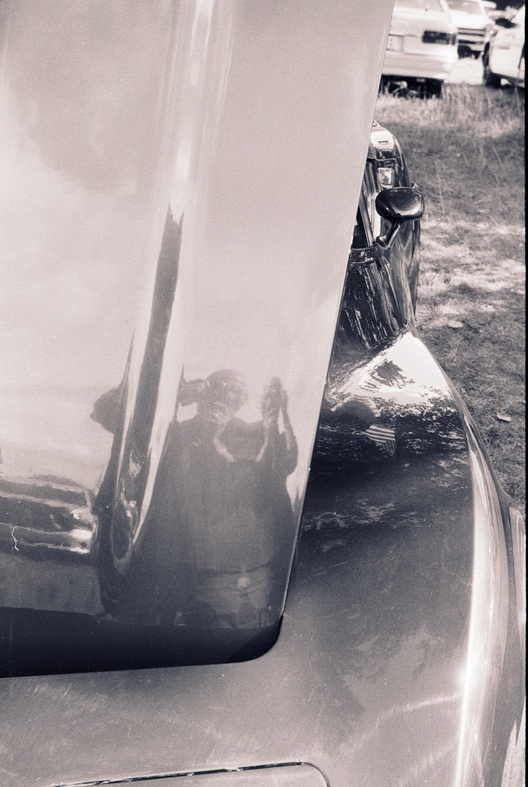 Spiegelung an einem Oldtimer, aufgenommen mit der Voigtländer Vitoret